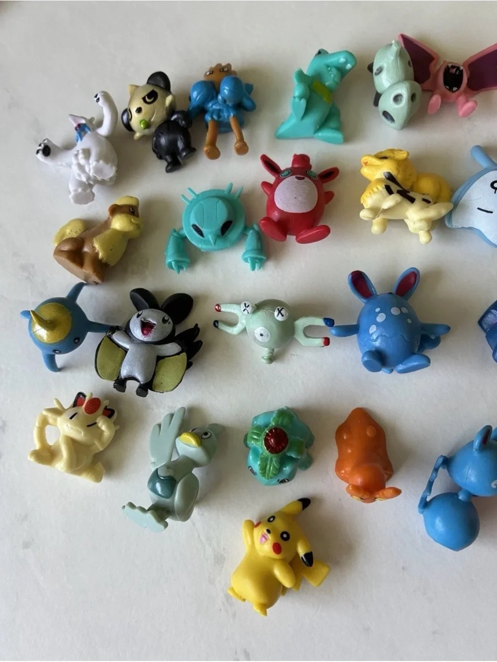 Pokémon Mini Figurine Lot - Assorted Colors (Yellow, Blue, Pink, Green)